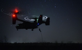 Illustration for article titled Las alas del V-22 Osprey se despliegan como si fuese un Transformer